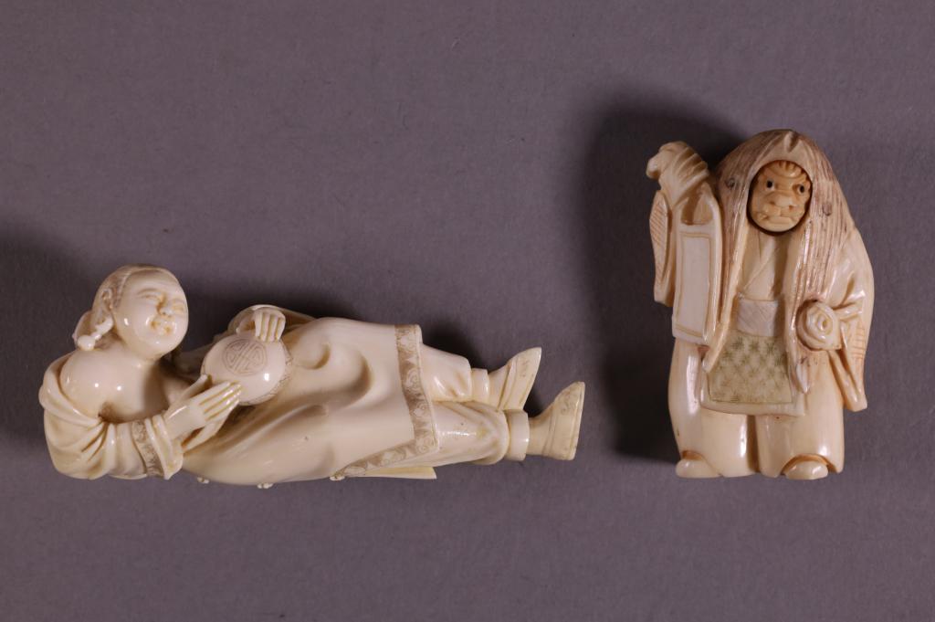 TWO CHINESE BONE CARVINGS: REVOLVING HEAD BONE CARVING. & PARTIAL NUDE FEMALE SNUFF BOTTLE. GOOD CONDITION. 3" H
