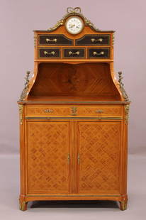 AMEUBLEMENTS MAISON FOREST PARIS SECRETARY: LOUIS XIV STYLE SECRETARY WITH UPPER CLOCK. FLORAL INLAID. 5 UPPER DRAWERS WITH LEATHER FRONTS. TWO LOWER DRAWERS. PULL OUT TRAY, TWO LOWER DOORS. WITH KEY AND CLOCK KEY. 35" W x 16 1/2" D x 63" H. AL