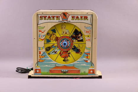 STATE FAIR STRENGTH TESTER GAME: BACK TO A 1950'S PINBALL GAME. BY SUPERIOR TOYS. MODEL 7640, PAINTED TIN LITHO TABLE TOP MACHINE, UNKNOWN WORKING ORDER. 16" W x 15" H.