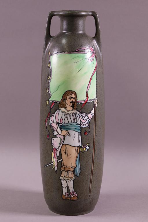 TEPLITZ STELLMACHER TALL VASE: CAVALIER PATTERN. MARKED ON BASE 2439. NO CHIPS CRACKS OR BREAKS. 14" H