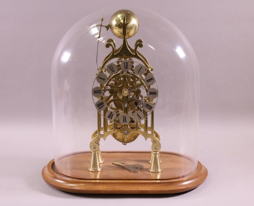 SKELETON CLOCK IN GLASS DOME (1 of 3)