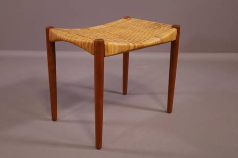 WILLY BECK DANISH MODERN FOOTSTOOL: MADSEN & LARSEN DENMARK. LABEL ON BOTTOM. 2 MINOR HOLES ON RATTAN. 22" x 16" x 18 1/2"