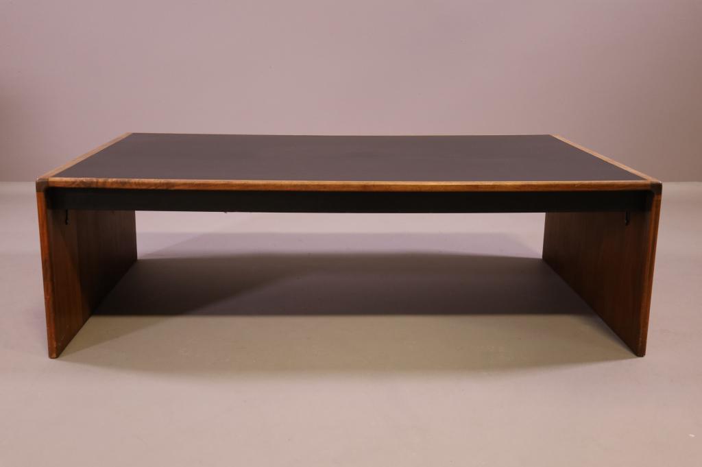 MID CENTURY MODERN COFFEE TABLE: TEAK FRAME WITH LAMINATE TOP. GOOD CONDITION. 50" L x 30" W x 15" H. THIS ITEM EXCEEDS SIZE LIMITATIONS FOR IN HOUSE SHIPPING.