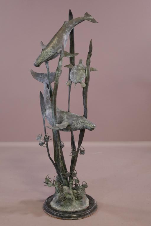 LARGE BRONZE WHALE SCULPTURE: BRONZE & MARBLE SCULPTURE, WHALE AND FISH DESIGN. WEAR TO SURFACE FROM BEING OUTDOORS. 55" H. THIS ITEM EXCEEDS SIZE LIMITATIONS FOR IN HOUSE SHIPPING.
