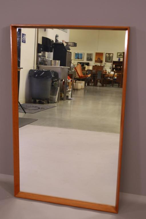 TEAK PEDERSON AND HANSEN WALL MIRROR: TEAK HANGING WALL MIRROR. MARKED PEDERSON AND HANSEN. GOOD CONDITION. 27 1/2" x 45" THIS ITEM EXCEEDS SIZE LIMITATIONS FOR IN HOUSE SHIPPING.