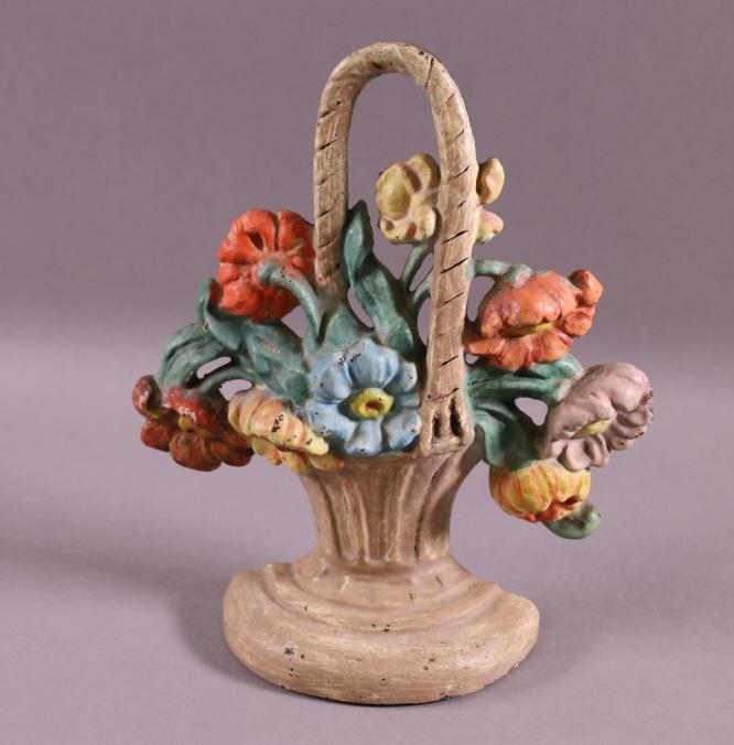 ANTIQUE CAST IRON FLOWER BASKET DOORSTOP (1 of 2)