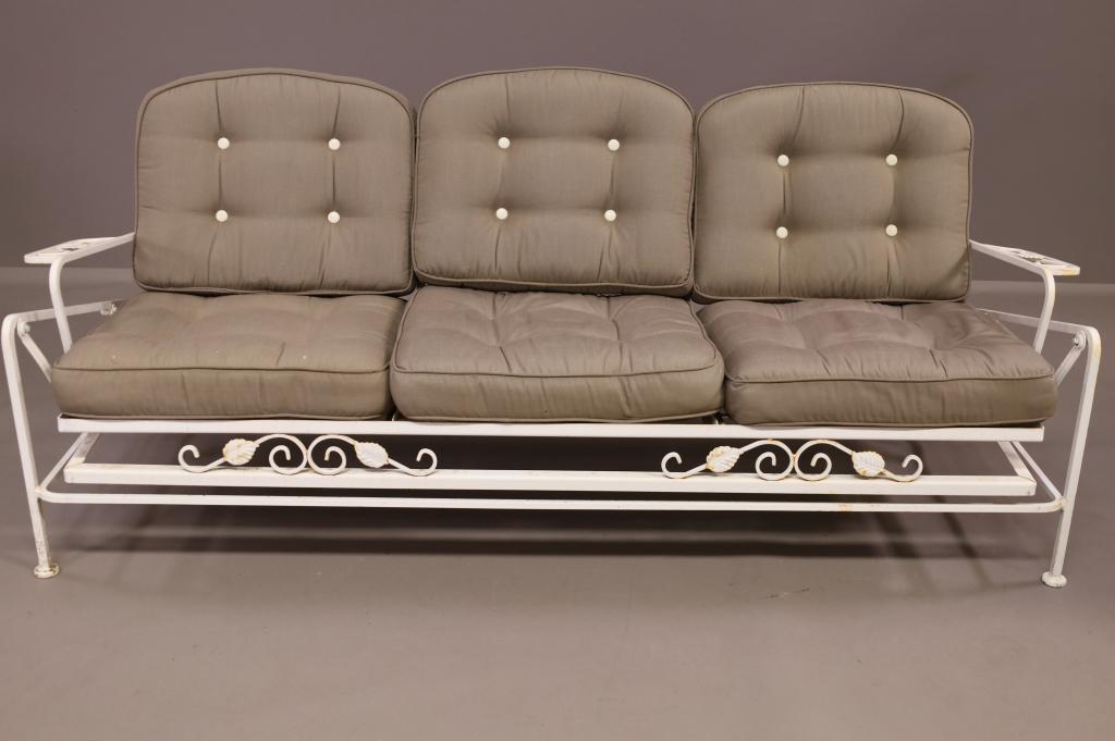 CAST METAL GARDEN GLIDER: CAST METAL GLIDER WITH CUSHIONS. MINOR WEAR TO SURFACE. 72" L x 27" D x 32" H. THIS ITEM EXCEEDS SIZE LIMITATIONS FOR IN HOUSE SHIPPING.