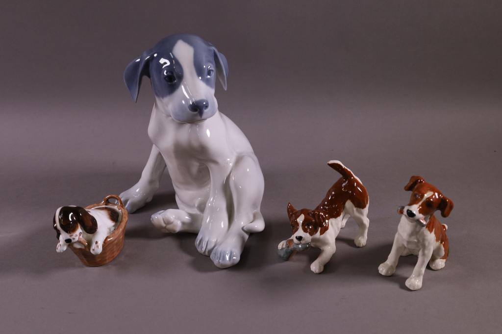 FOUR PORCELAIN DOG FIGURES (1 of 3)