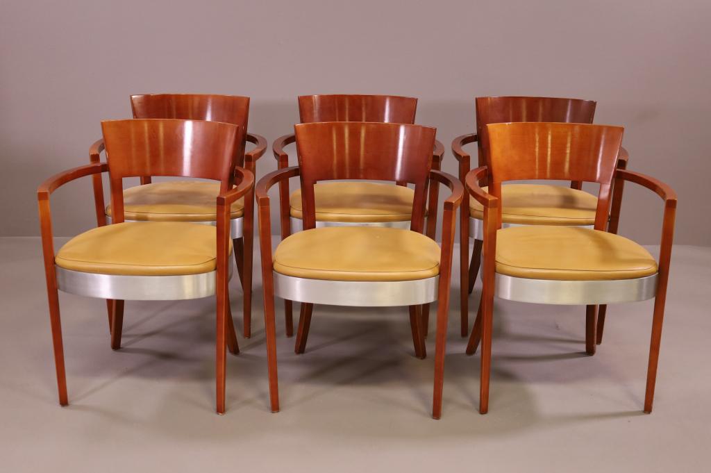 SIX BERNHARDT CHERRY BOARDROOM CHAIRS: CHERRY FRAME, LEATHER SEAT. MARKED WITH TAG ON UNDERSIDE. SURFACE SCUFFS AND SCRATCHES. 23 1/2" W x 23 1/2" D x 32 1/2" H. THIS ITEM EXCEEDS SIZE LIMITATIONS FOR IN HOUSE SHIPPING.
