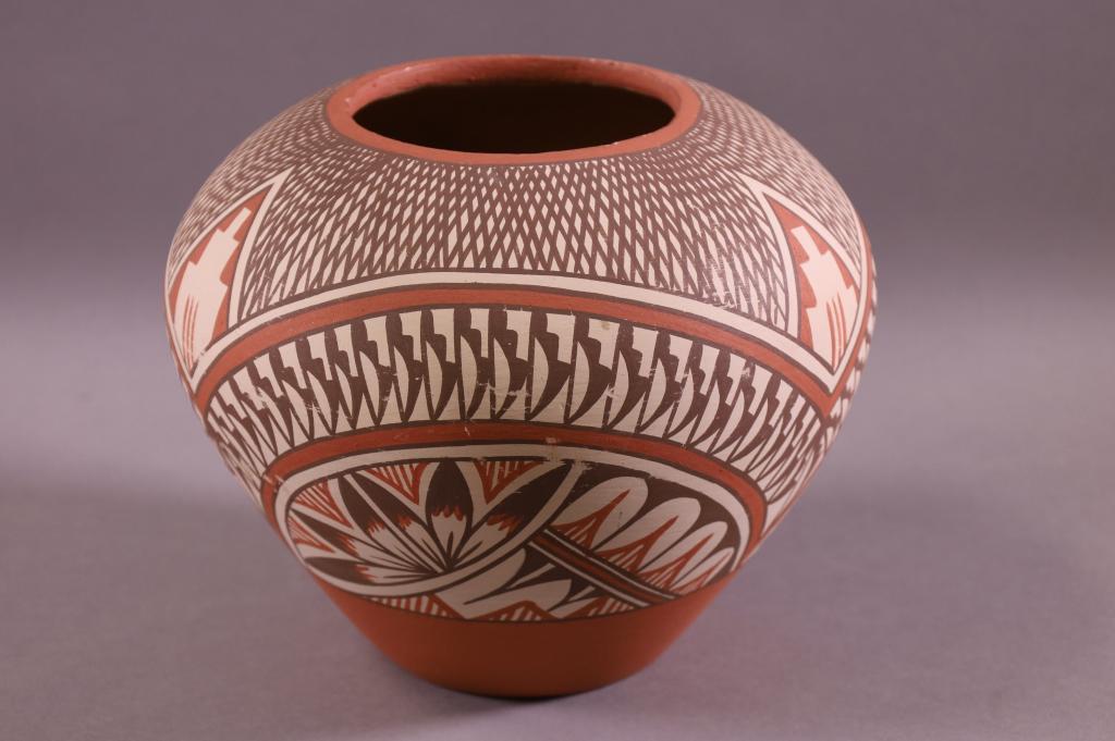 NATIVE AMERICAN POTTERY BOWL: SIGNED ON BASE, A. TAFOYA YIMEZ. HAND PAINTED JIMEZ PUEBLO BOWL. GOOD CONDITION. 7 3/4" DIAM x 6 3/4" H.