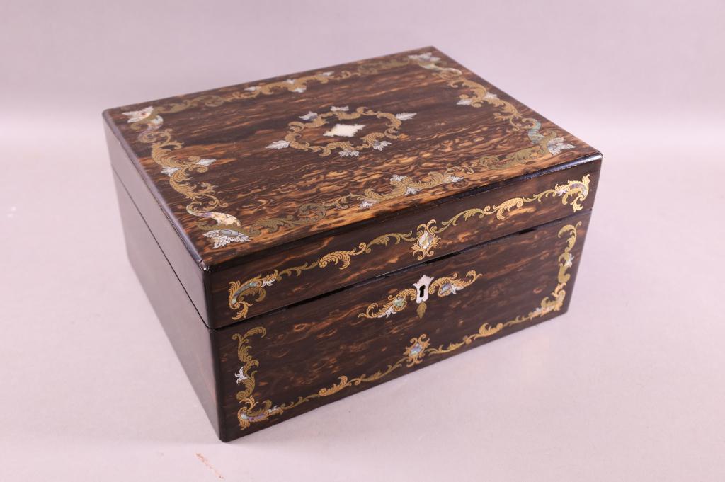 19TH CENTURY INLAID SEWING BOX: MOTHER OF PEARL INLAY, HINGED LID, FITTED INTERIOR. SOME WEAR TO INTERIOR, CRACK TO CORNER OF BOX. 12" W x 9" D x 6" H.