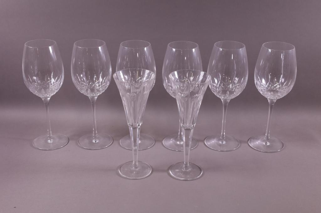EIGHT WATERFORD STEMS: SIX LARGE WINE GLASSES, & TWO CHAMPAGNE FLUTES. MARKED. GOOD CONDITION. 10 1/2" H & 9" H.