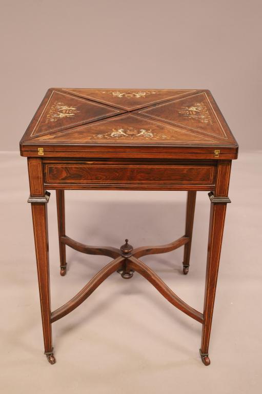 19TH CENTURY INLAID HANKERCHIEF TABLE: HANKERCHIEF GAME TABLE, INLAID TOP, FELT TOP. SOME LOSS TO INLAY, STAINED FELT. 22" x 22" x 29 1/2" H. THIS ITEM EXCEEDS SIZE LIMITATIONS FOR IN HOUSE SHIPPING.