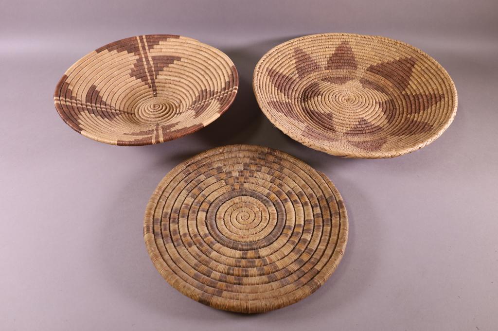 THREE HAND WOVEN NATIVE AMERICAN ITEMS: HAND WOVEN LOW BOWLS & TRAY. GOOD CONDITION. 12" DIAM TRAY & BOWLS 13" DIAMD & 15" DIAM.