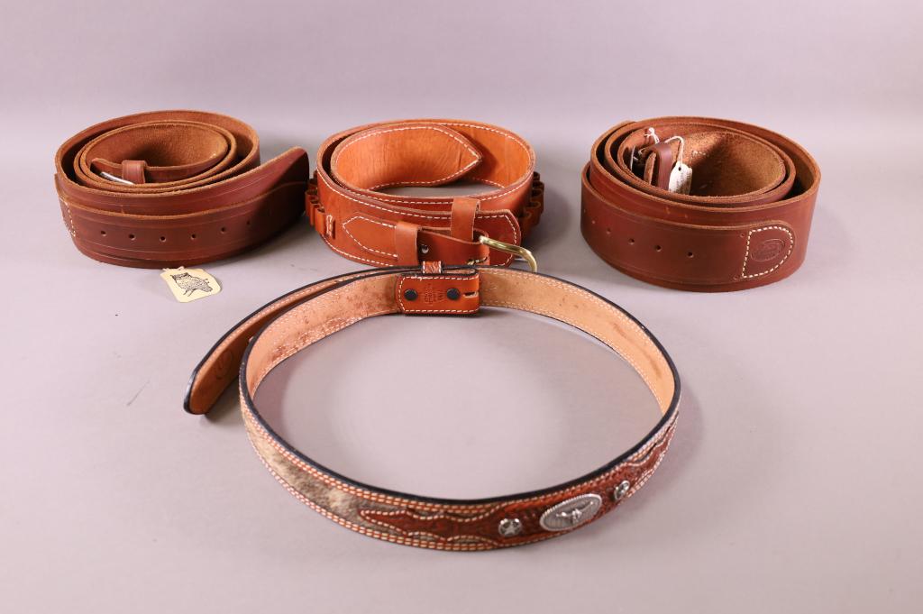 COLLECTION OF LEATHER BELTS: DECORATIVE AND AMMO BELTS. ONE IS SIGNED. C. MARTENS.