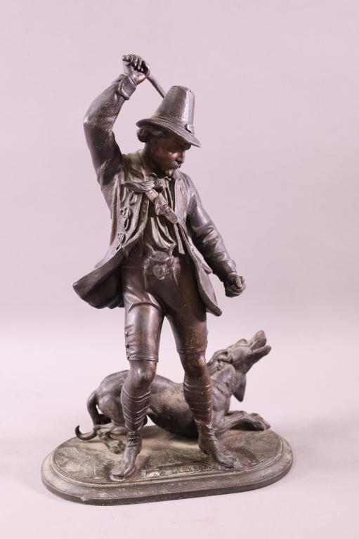 ANTIQUE MAN WITH DOG CAST METAL STATUE (1 of 3)