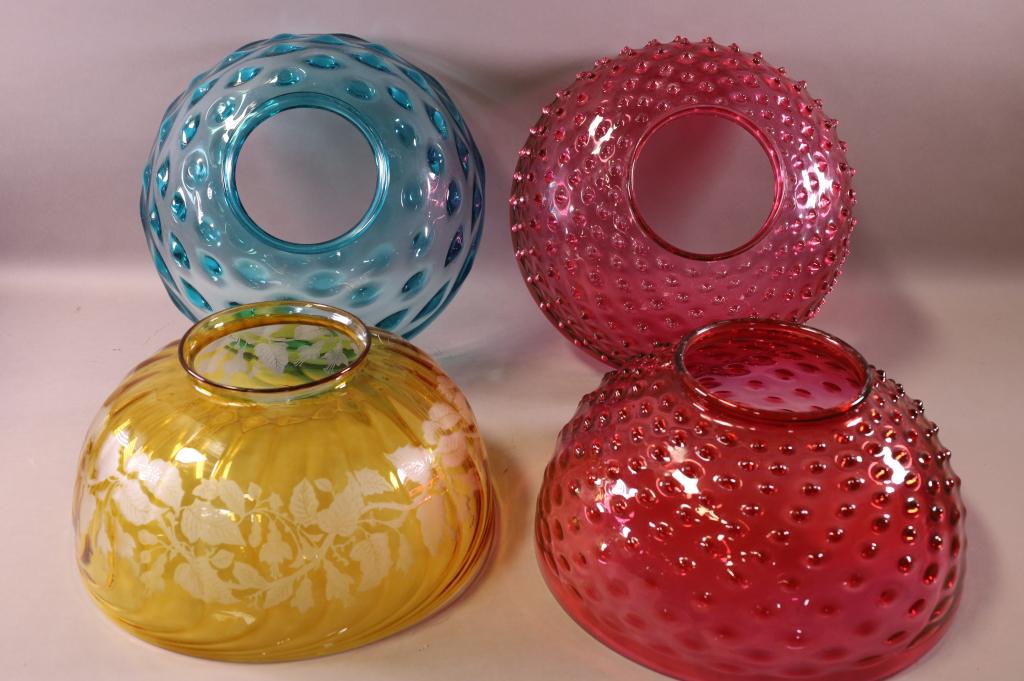 FOUR VICTORIAN GLASS SHADES: CRANBERRY, PINK, GREEN, & AMBER. GOOD CONDITION. 5 1/2" DIAM OPENINGS.