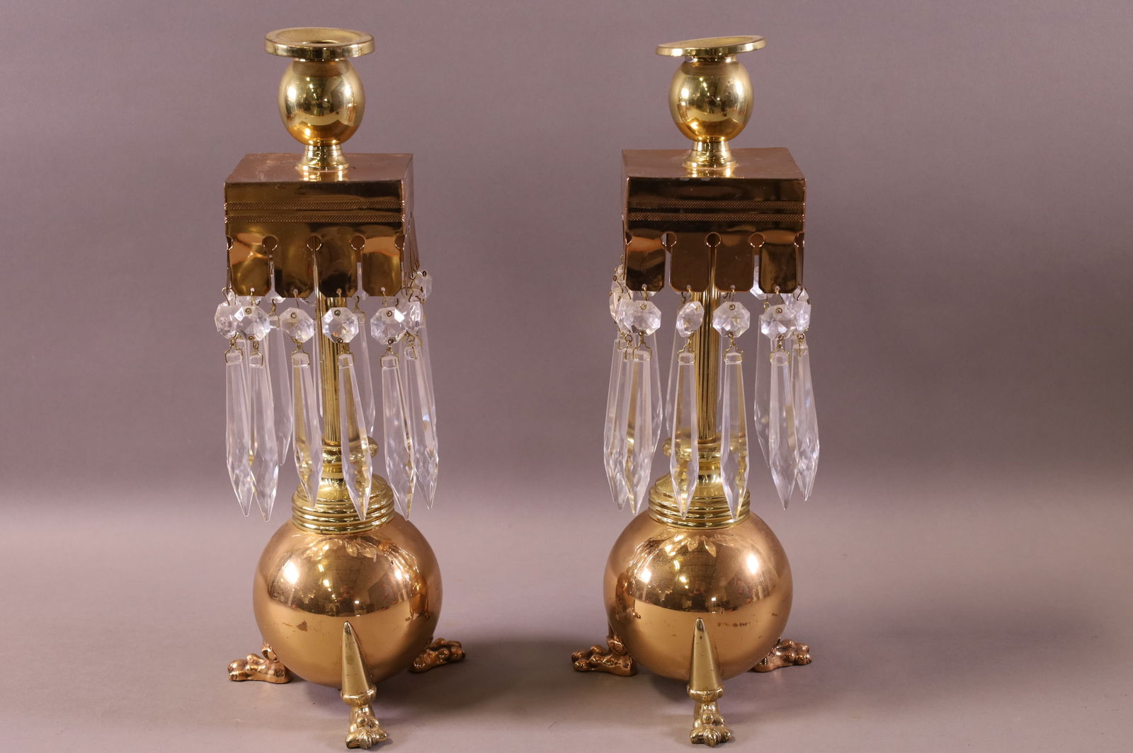 PAIR OF VICTORIAN CLAW FOOT BRASS CANDLEHOLDERS (1 of 2)