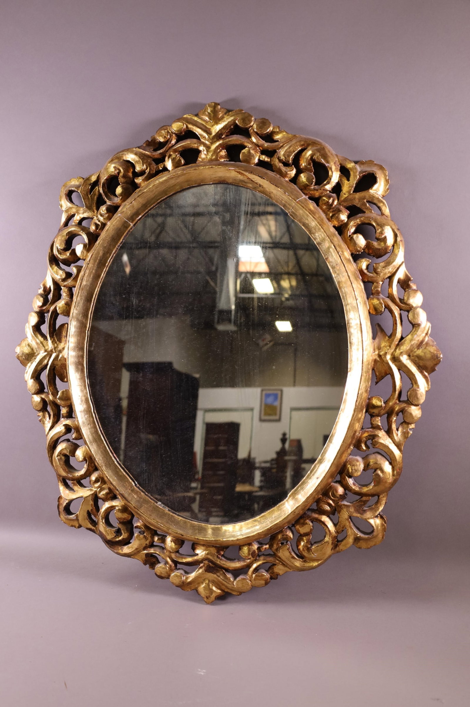 ITALIAN WALL MIRROR: GILT WOOD FRAMED ITALIAN WALL MIRROR. 24" x 27" IN FRAME