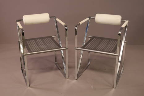 PAIR OF MARIO BOTTA ARM CHAIRS: PAIR OF MARIO BOTTA SECONDA FOR ALIAS ITALY. CHROME AND WHITE LEATHERETTE. MISSING SEAT. UPHOLSTERY NEEDS CLEANED. 20 1/2" W x 20" D x 30" H. THIS ITEM EXCEEDS SIZE LIMITATIONS FOR IN HOUSE SHIPPING.