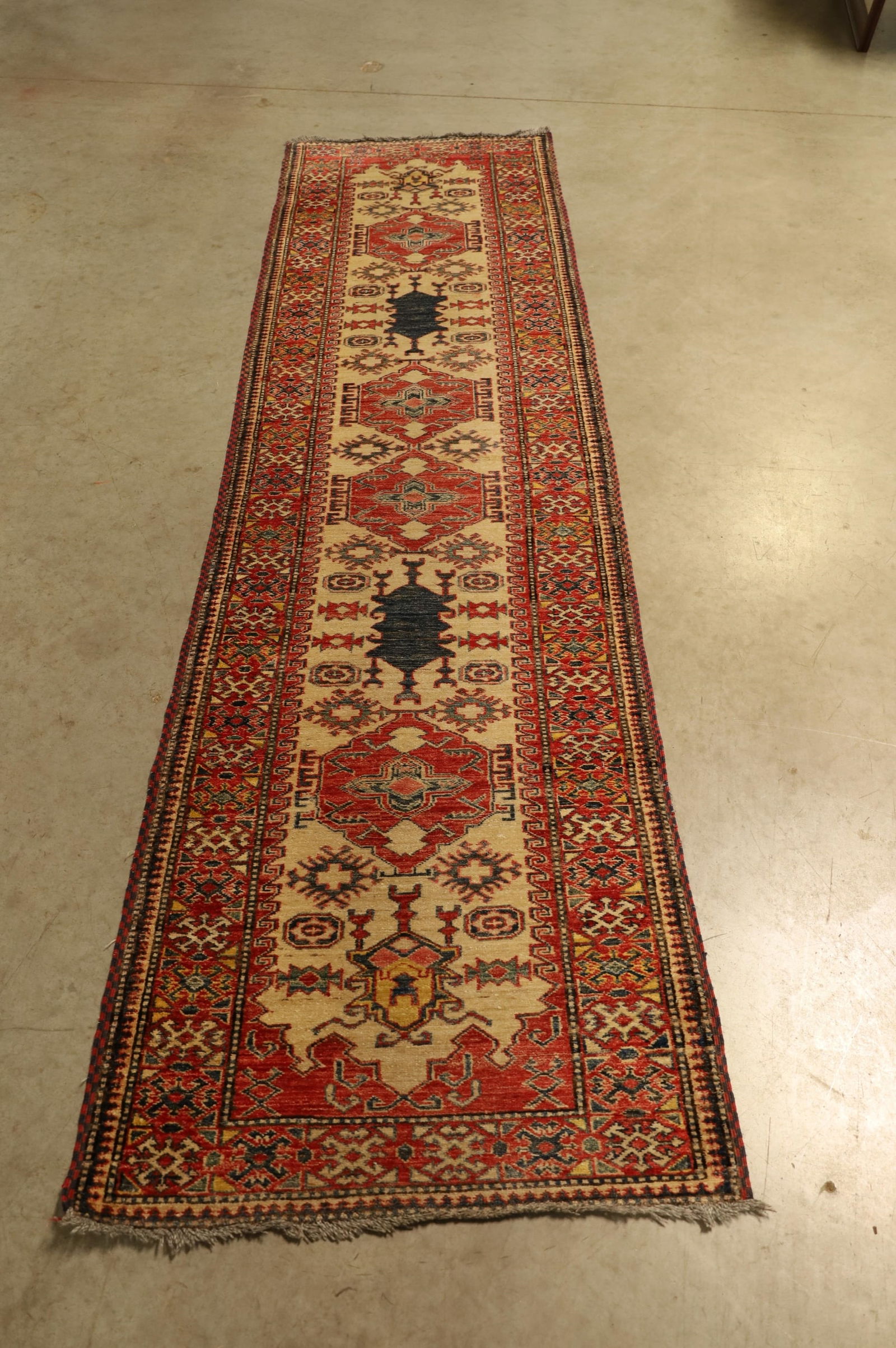 APPROX 9' 8" x 2' 8" HANDMADE WOOL RUG (1 of 4)
