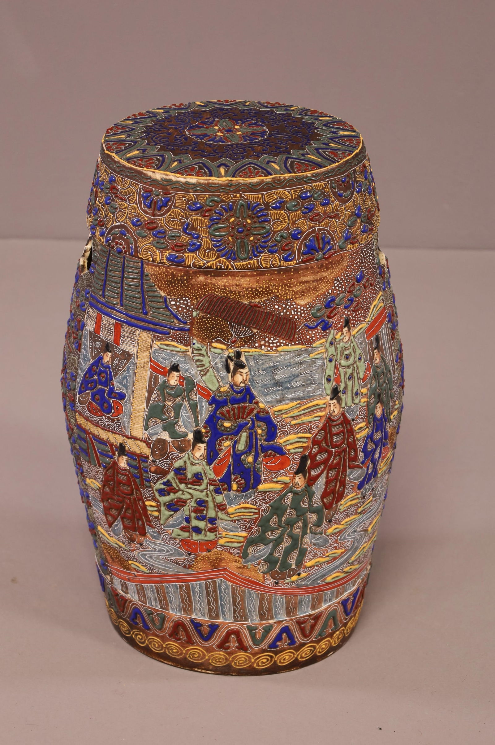 CHINESE PORCELAIN GARDEN SEAT: ASIAN MOTIF, PORCELAIN GARDEN SEAT. UNSIGNED. MINOR WEAR TO SURFACE. 9 1/2" DIAM x 21" H. THIS ITEM EXCEEDS SIZE LIMITATIONS FOR IN HOUSE SHIPPING.