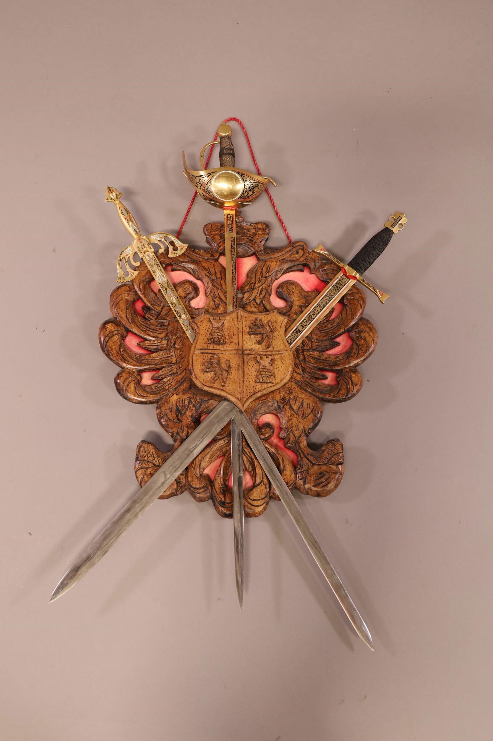 VINTAGE WOOD CREST W/ DECORATIVE SWORDS (1 of 3)