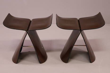 PAIR OF BUTTERFLY STOOLS: SORI YANAGI STYLE BUTTERFLY STOOLS. UNMARKED. SOME VENEER CHIPS. 17" W x 12" D x 17" H. THIS ITEM EXCEEDS SIZE LIMITATIONS FOR IN HOUSE SHIPPING.