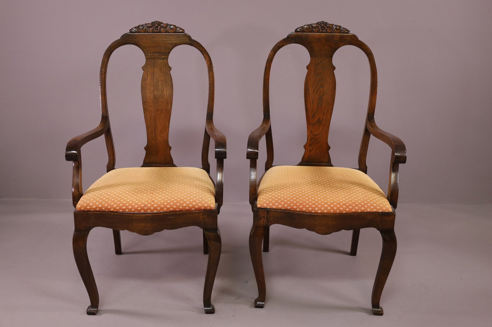 PAIR OF ANTIQUE OAK TALL BACK ARMCHAIRS: OAK ARMCHAIRS, ROLLED ARM. MINOR WEAR TO FINISH. 24" W x 25" D x 44" H. THIS ITEM EXCEEDS SIZE LIMITATIONS FOR IN HOUSE SHIPPING.