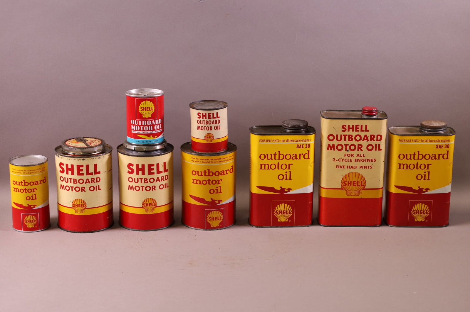 NINE SHELL OUTBOARD OIL CANS (1 of 2)