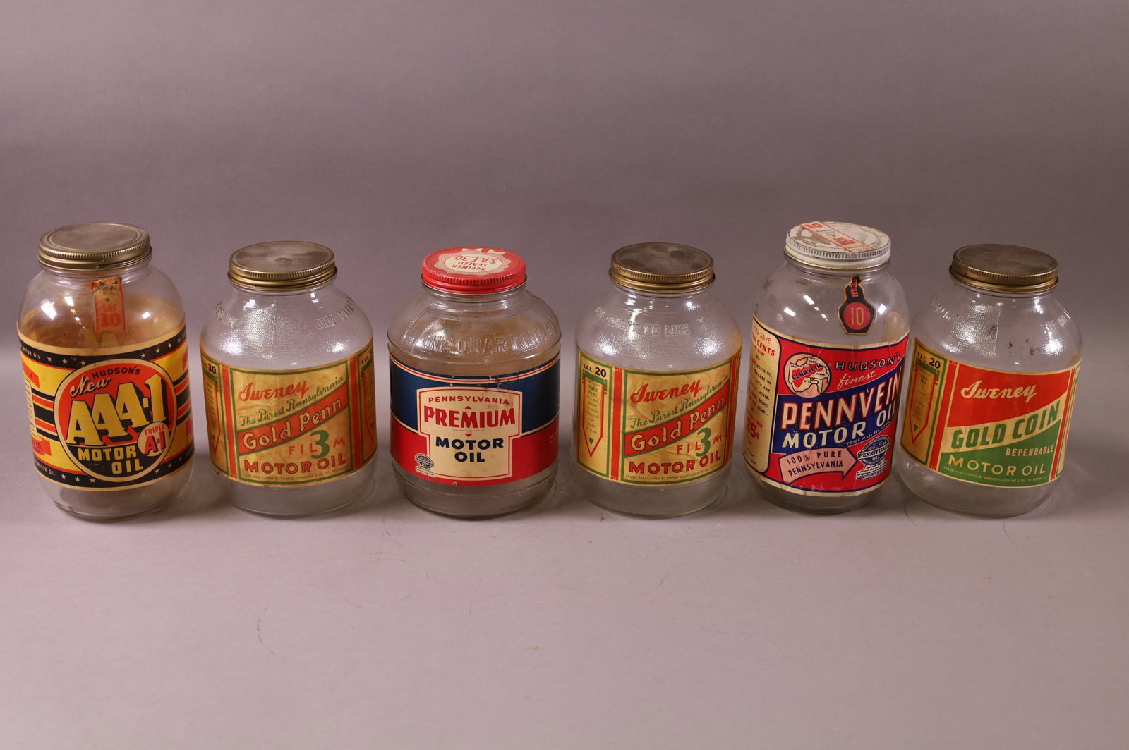 SIX OIL JARS (1 of 3)