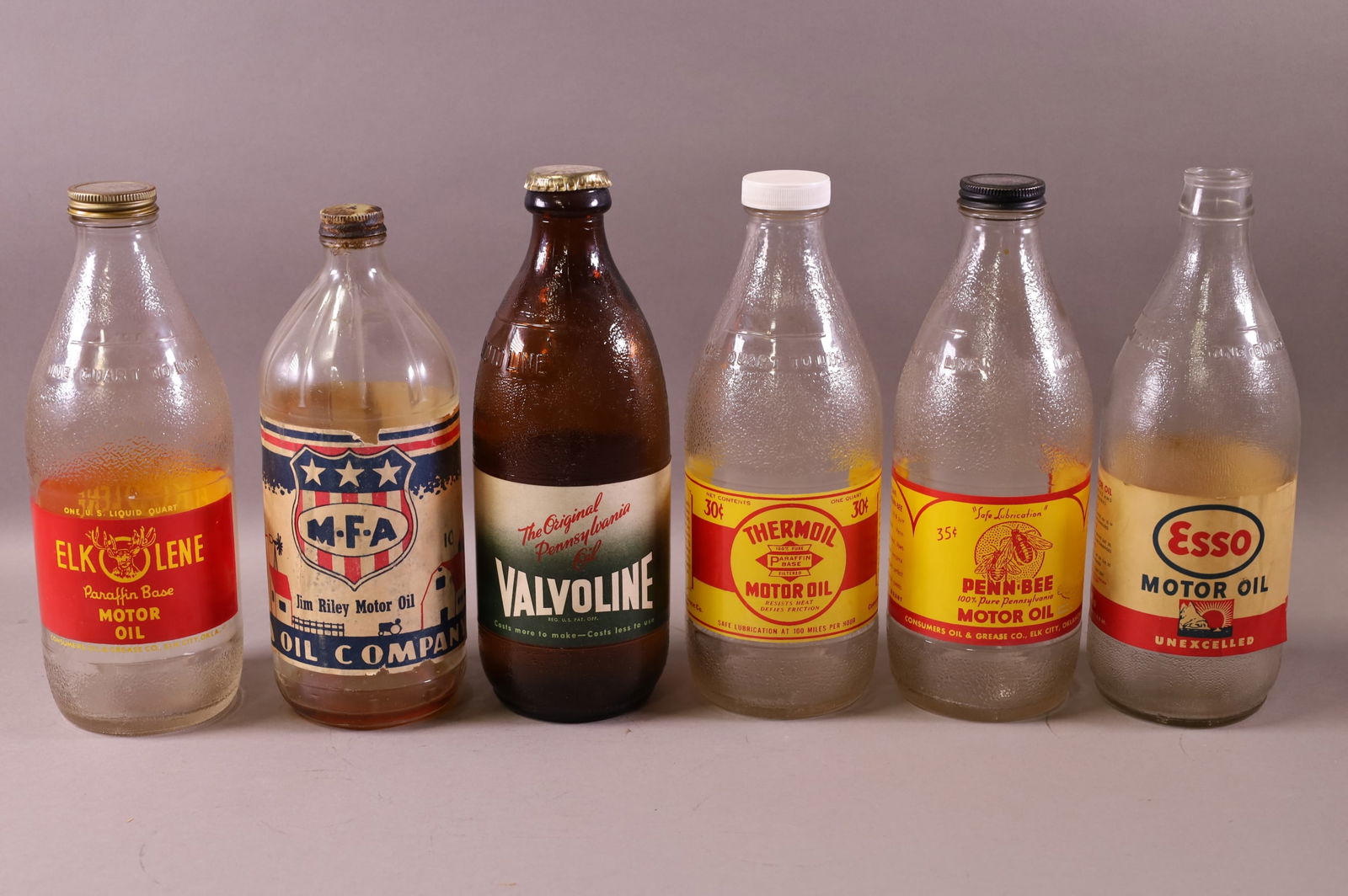 SIX OIL JARS (1 of 2)