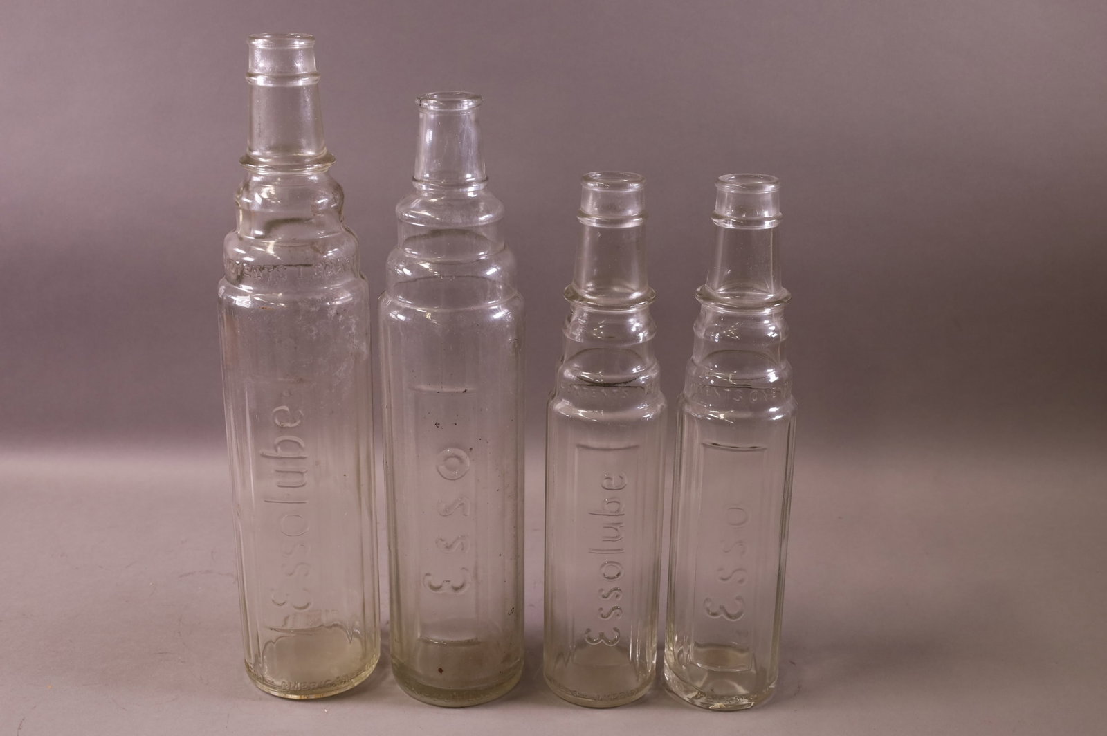 FOUR ESSO OIL BOTTLES (1 of 3)
