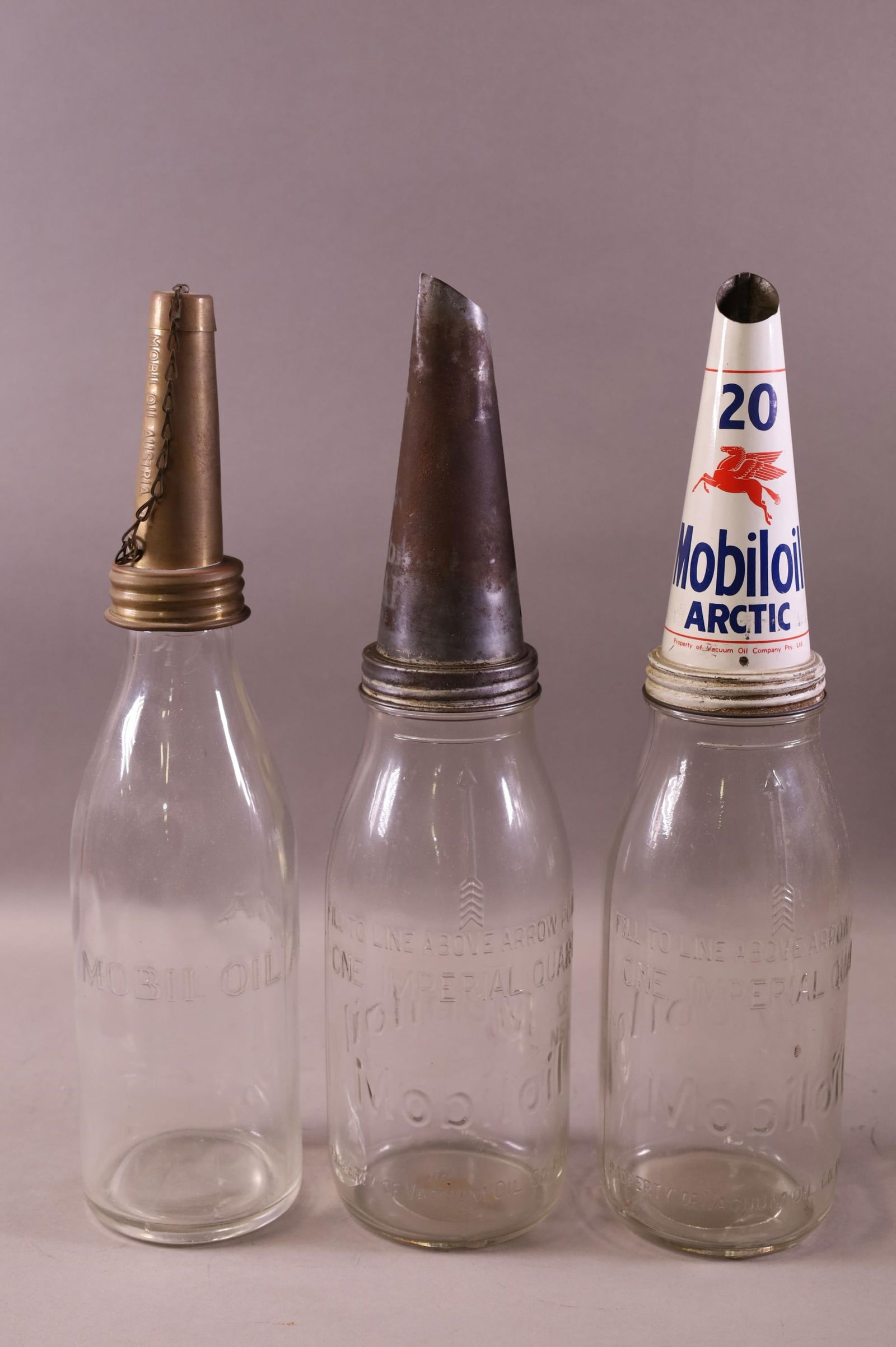 THREE MOBILOIL OIL BOTTLES (1 of 4)