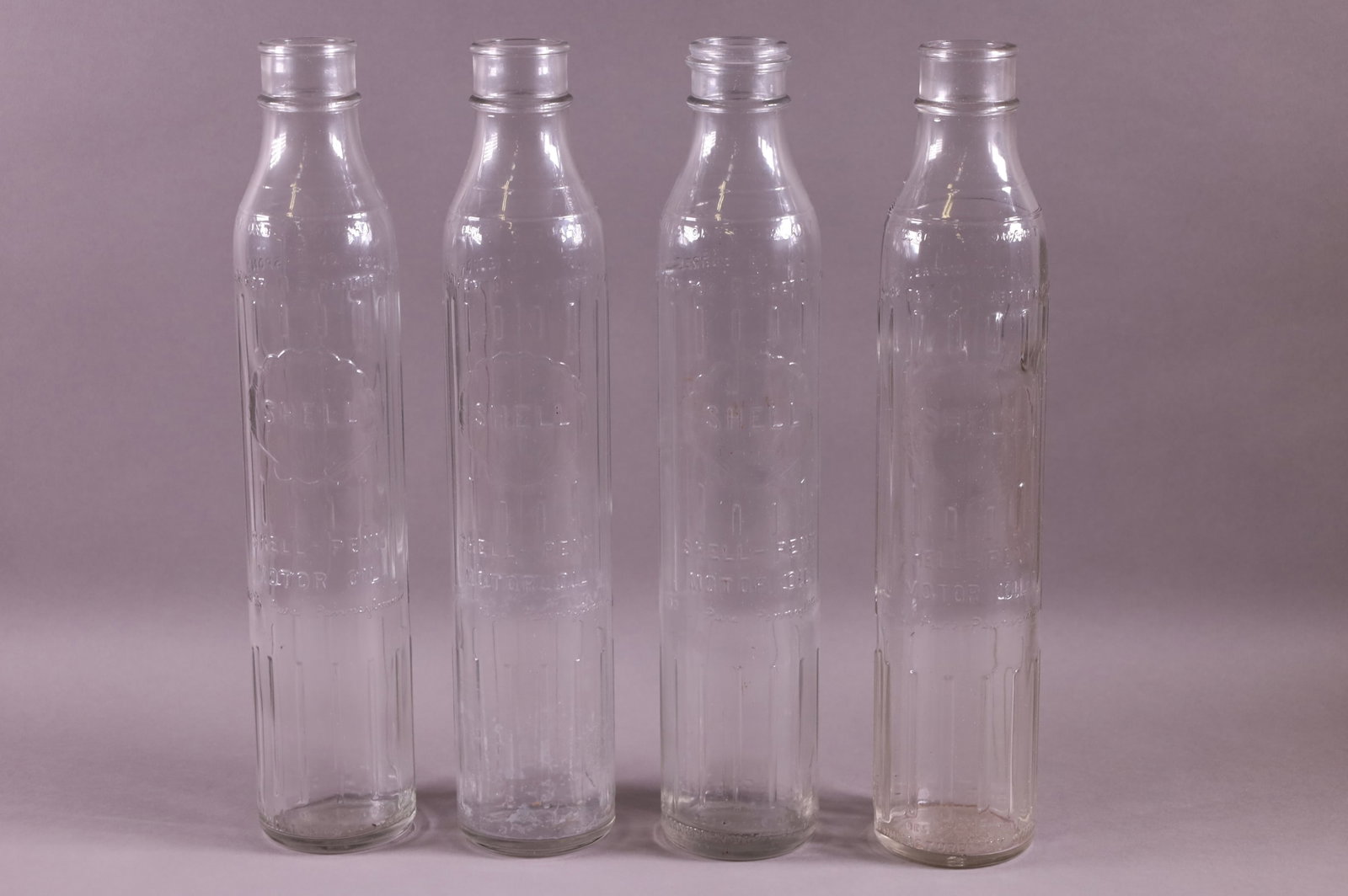 FOUR SHELL PENN OIL BOTTLES (1 of 2)