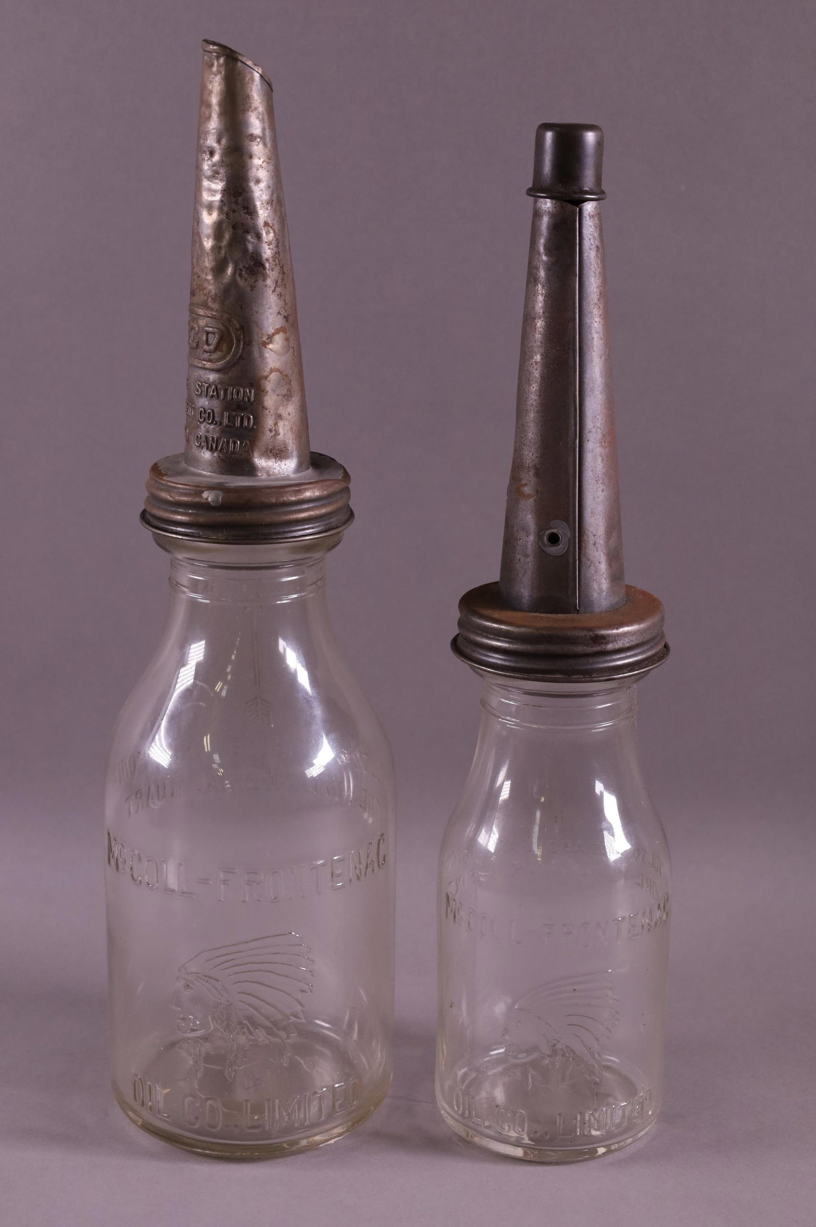TWO MCCOLL FRONTENAC OIL BOTTLES (1 of 3)