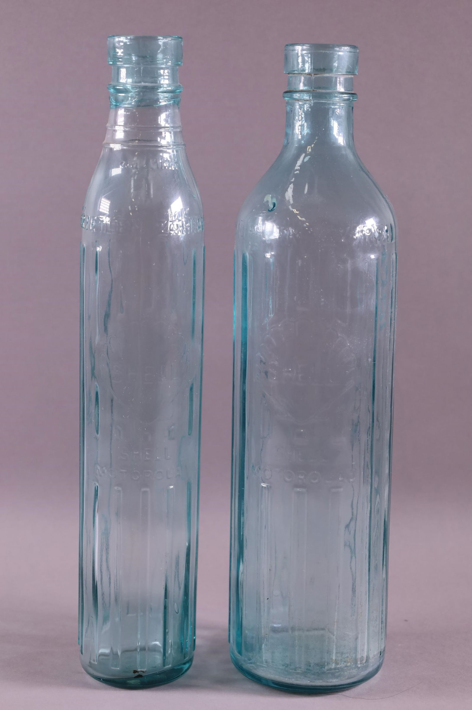 TWO SHELL OIL BOTTLES (1 of 3)