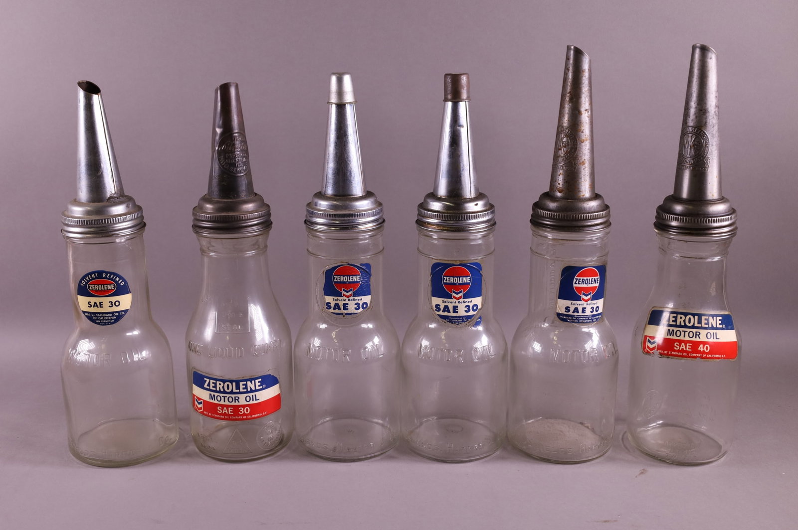 SIX ZEROLENE OIL BOTTLES (1 of 3)