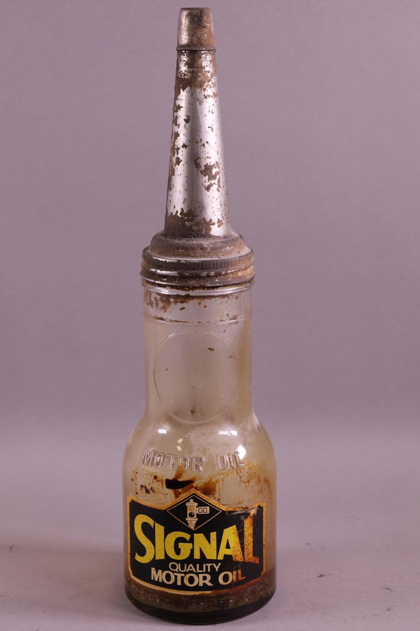 SIGNAL OIL BOTTLE: SIGNAL QUALITY MOTOR OIL, SHILEDS HARPER & CO. OIL BOTTLE.