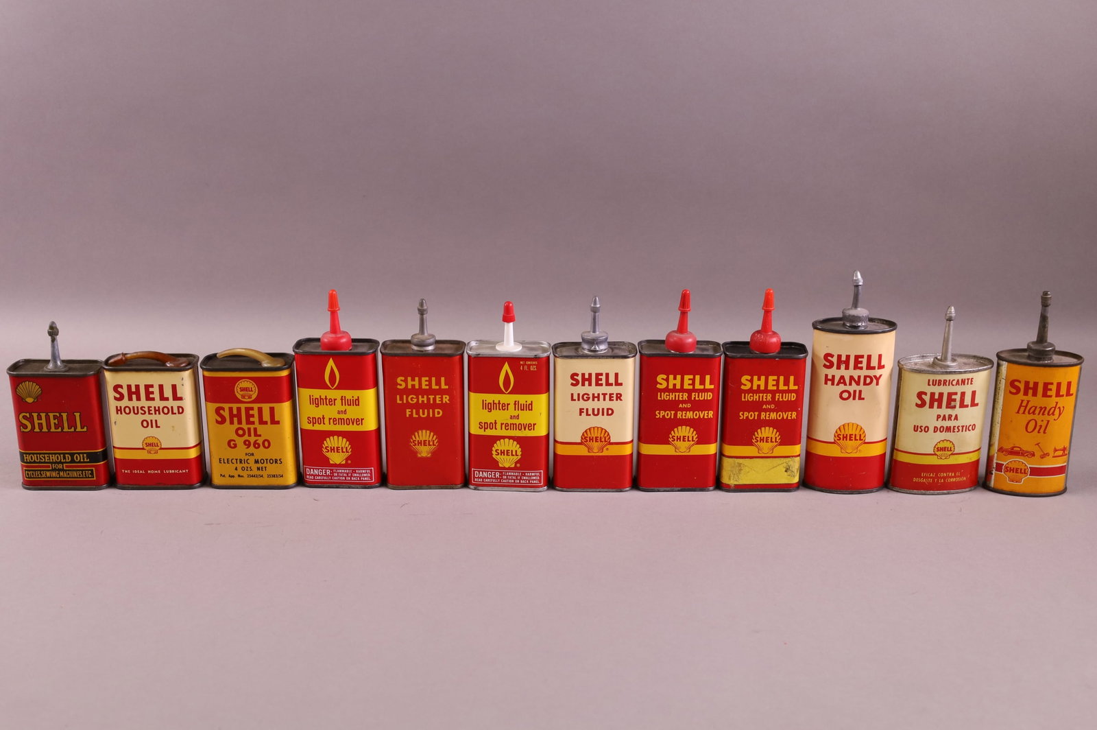 TWELVE SHELL HOUSEHOLD HANDY OIL CANS (1 of 3)