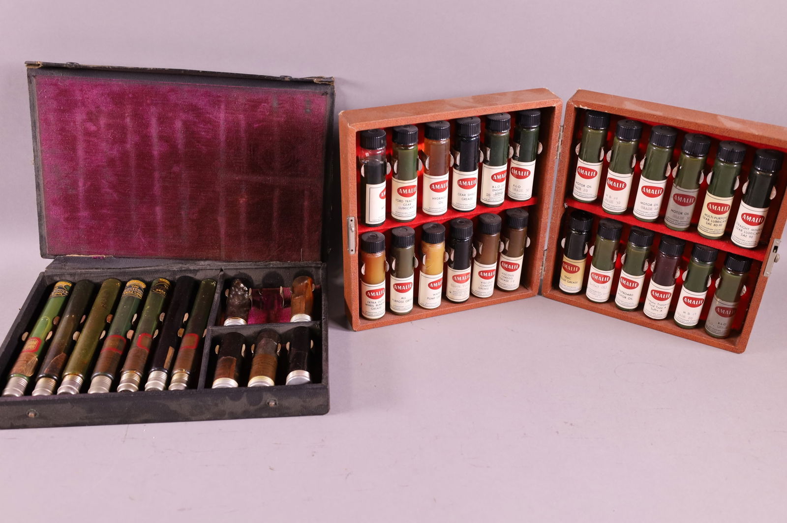 Two Amalie Salesman Sample Oil Bottle Sets Auction