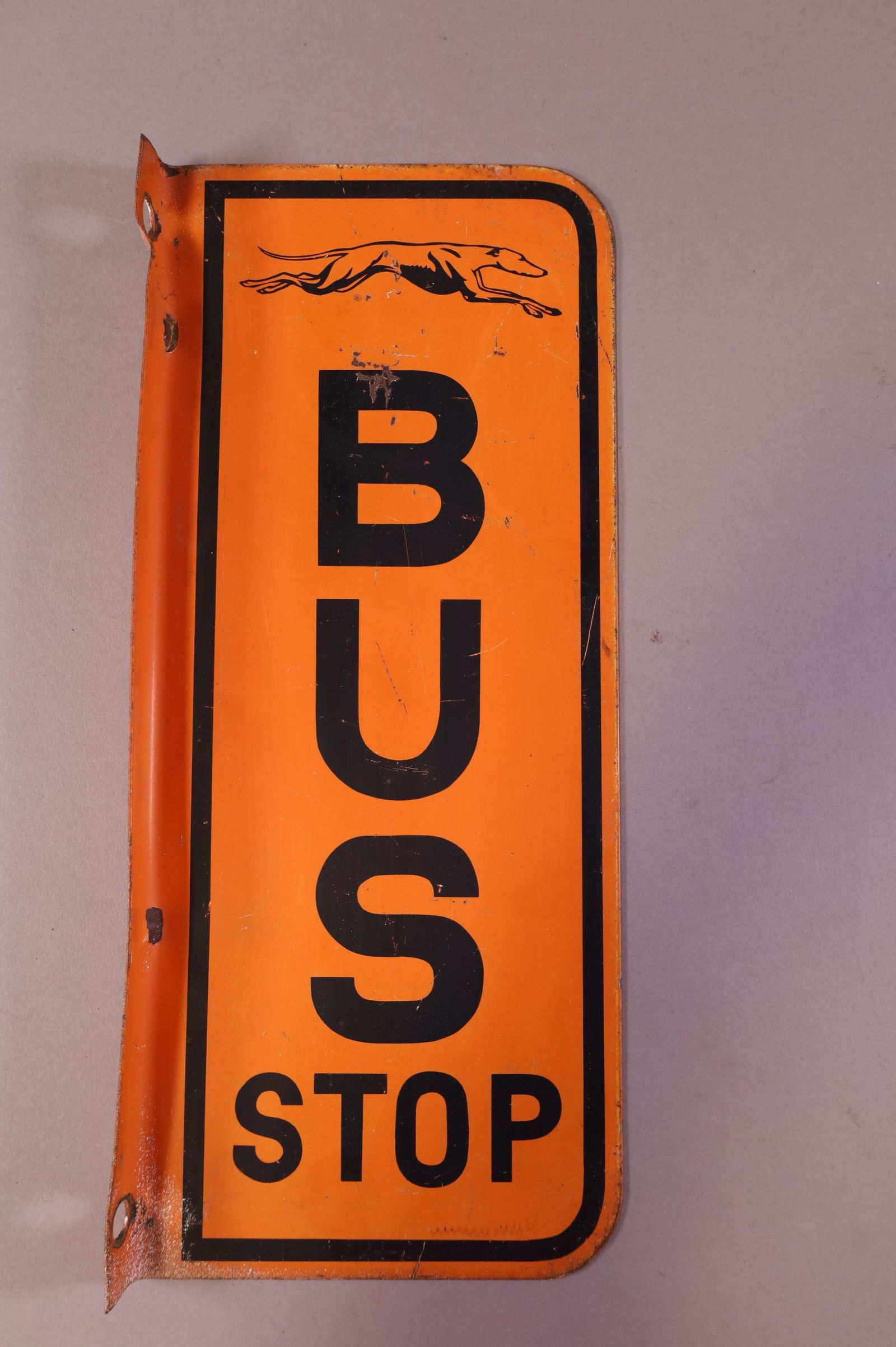 Greyhound bus stop flange tin sign auction