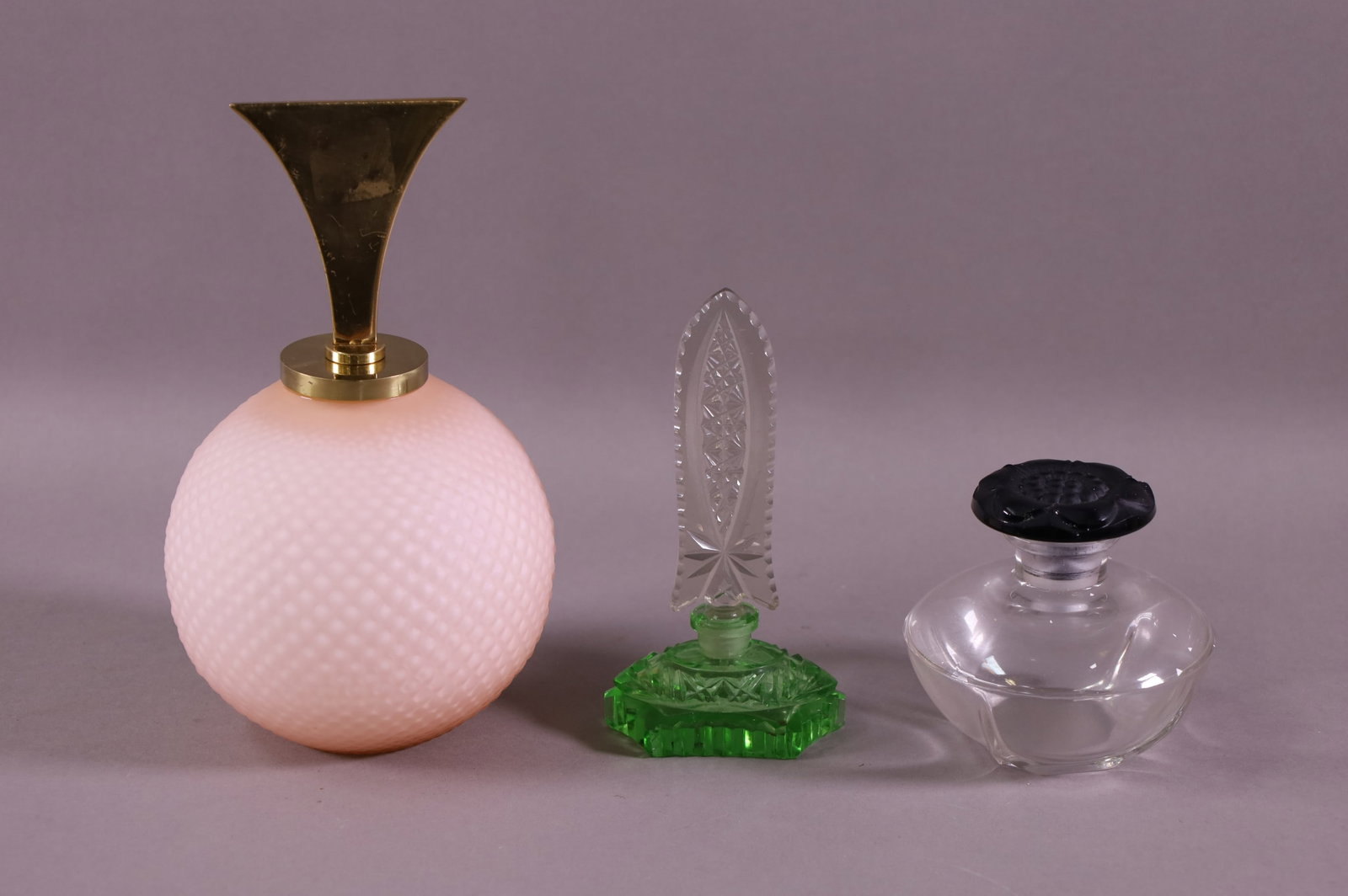 THREE PERFUME BOTTLES (1 of 3)