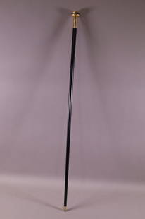 VICTORIAN WALKING STICK: VICTORIAN WALKING STICK WITH UNMARKED 9KT. GOLD TOP WITH JEWELED AMETHYST TYPE DECORATION. 32" L.