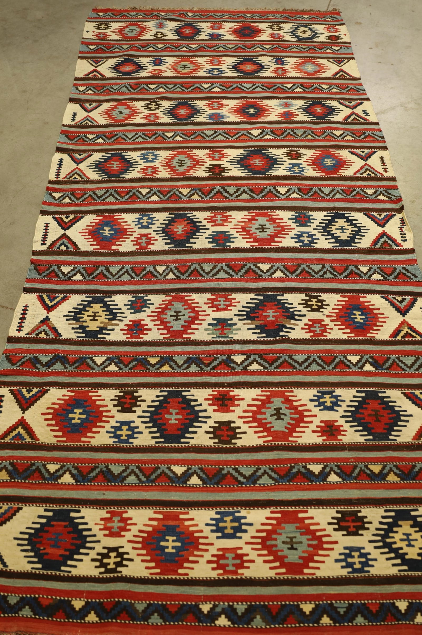 APPROX. 9' 11" X 4' 2" HANDMADE KILIM RUG (1 of 3)