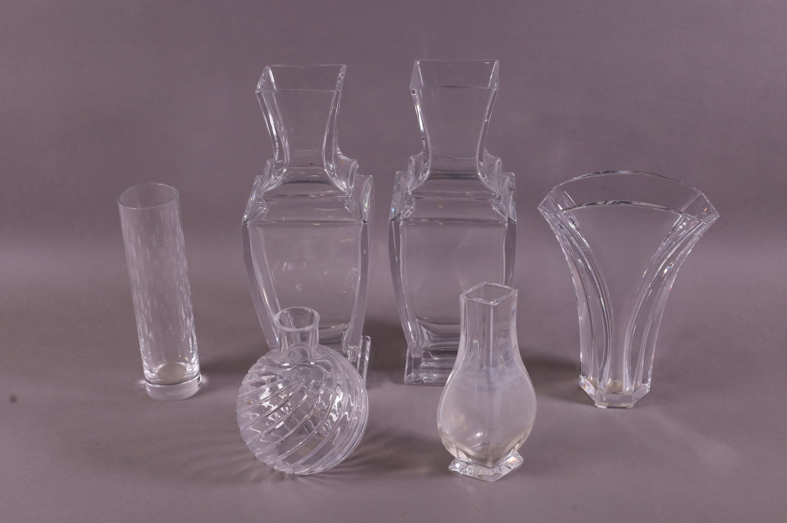 LOT OF 6 BACCARAT VASES: ALL SIGNED ON BOTTOM. RANGE IN HEIGHT FROM 4 3/4" TO 10 1/4".