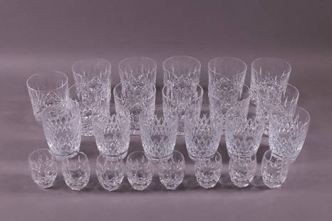 SET OF 25 WATERFORD GLASSES: 11 WATER GLASSES, 3 1/2" H. 8 SMALL GLASSES, 2 1/2" H. AND OTHERS. GOOD CONDITION.