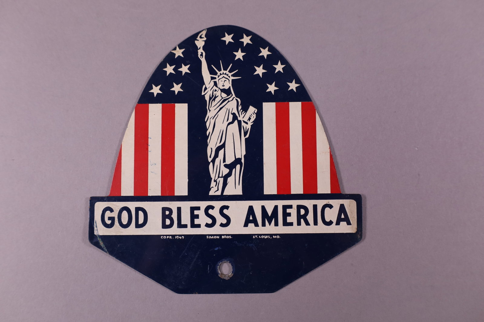 GOD BLESS AMERICA TIN LICENSE PLATE TOPPER: GOD BLESS AMERICA TIN LICENSE PLATE TOPPER. 6" W x 5 3/4" H