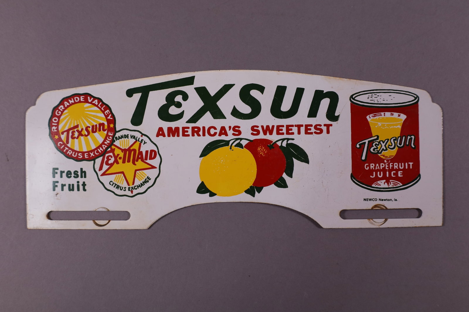 TEXSUN TIN LICENSE PLATE TOPPER: TEXSUN AMERICAS SWEETEST TIN LICENSE PLATE TOPPER. 10" W x 4" H.
