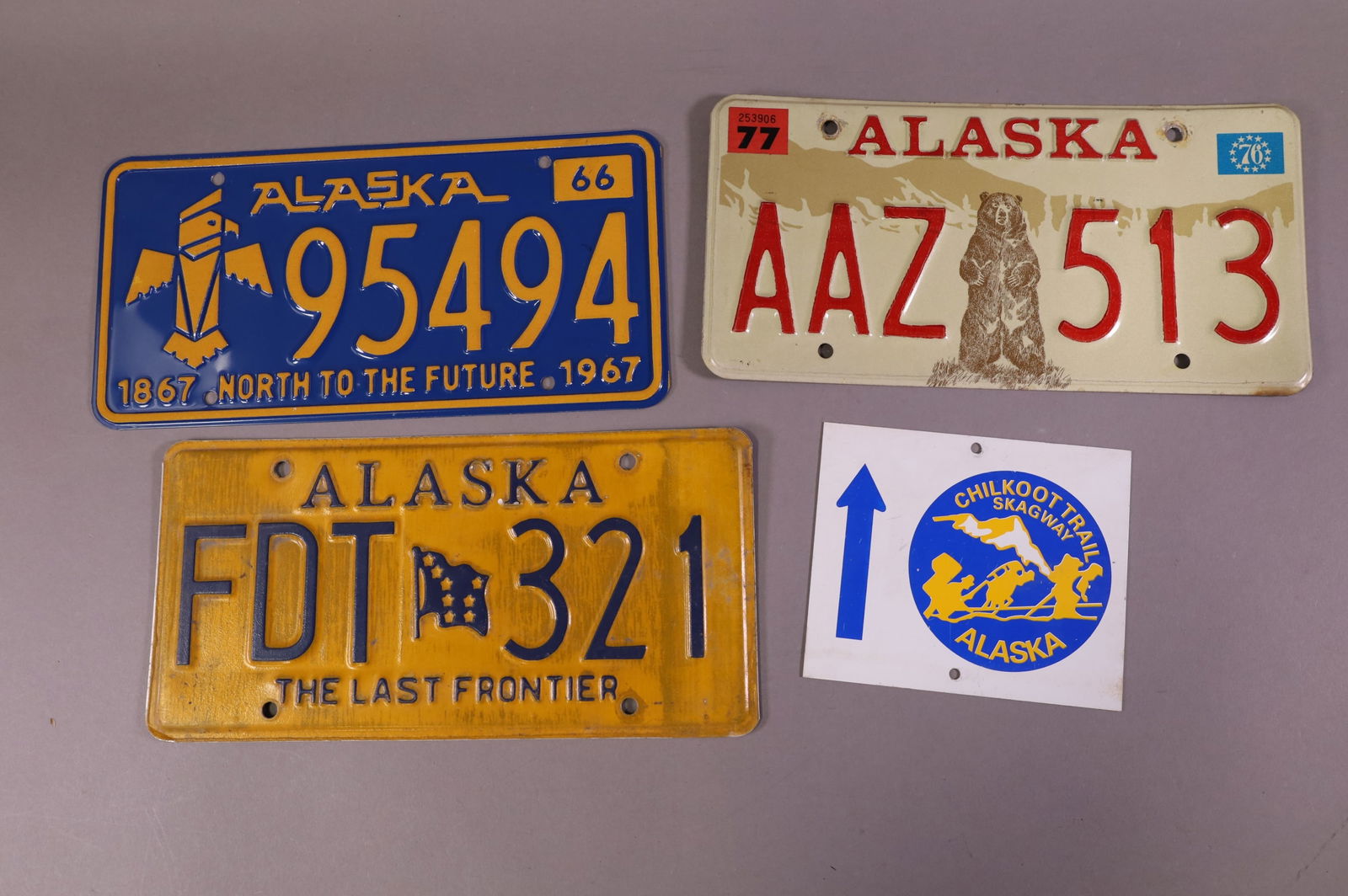 THREE ALASKA LICENSE PLATES (1 of 1)